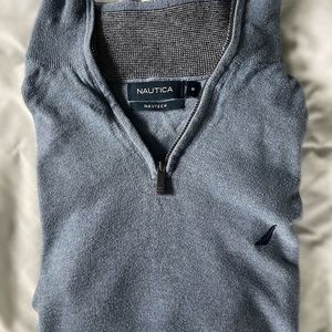 Light blue Nautica quarter zip sweater. In good condition barley worn.